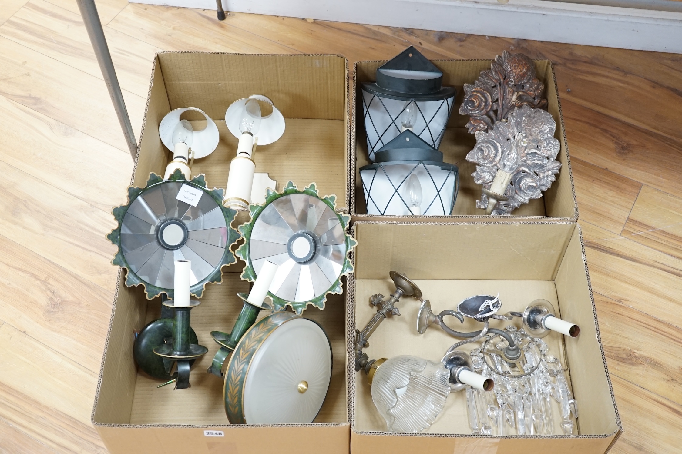 Twelve various lights: a lustre wall light, two branch chrome wall light, and glass shaded wall light, two pairs of toleware style wall lights and a similar ceiling and pair of plaster wall lights (12). Condition - fair